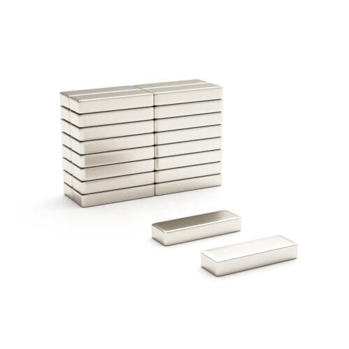Rectangular block Neodymium magnet with dimensions 12mm x 4mm x 2mm, grade N42, featuring a nickel-copper-nickel coating and an 0.86KG pull force, commonly used in DIY, crafts, furniture design, fixings, kitchen design, sale display units, scale models, lock mechanisms, science experiments, education, computing and many more.