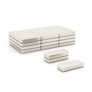 Rectangular block Neodymium magnet with dimensions 12mm x 5mm x 2mm, grade N42, featuring a nickel-copper-nickel coating and an 0.99KG pull force, commonly used in DIY, crafts, furniture design, fixings, kitchen design, sale display units, scale models, lock mechanisms, science experiments, education, computing and many more.