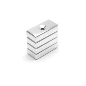 Rectangular Block Neodymium magnet with countersunk hole for screwing and with dimensions 20mm x 10mm x 4mm (4mm Hole), grade N42, featuring a nickel-copper-nickel coating and an 4.81KG pull force, commonly used in DIY, crafts, furniture design, fixings, kitchen design, lock mechanisms and science experiments.