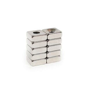 Square Block Neodymium magnet with countersunk hole for screwing and with dimensions 10mm x 10mm x 4mm x (4mm Hole), grade N42, featuring a nickel-copper-nickel coating and an 2.21KG pull force, commonly used in DIY, crafts, furniture design, fixings, kitchen design, lock mechanisms and science experiments.