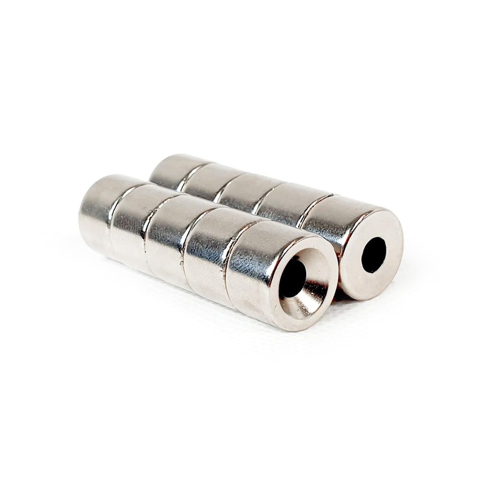 Round Circular Disc Neodymium magnet with countersunk hole for screwing and with dimensions 15mm x 10mm x (6mm Hole), grade N42 , featuring a nickel-copper-nickel coating and an 3.92KG pull force, commonly used in DIY, crafts, furniture design, fixings, kitchen design, lock mechanisms and science experiments.