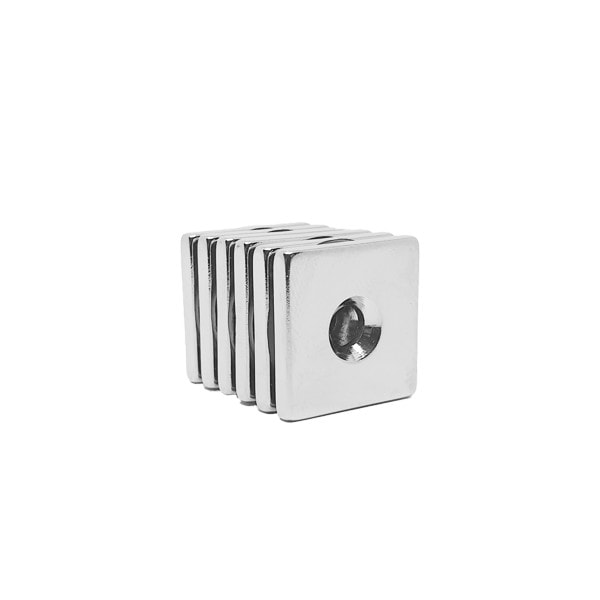 Square Block Neodymium magnet with countersunk hole for screwing and with dimensions 20mm x 20mm x 3mm x (4mm Hole), grade N42, featuring a nickel-copper-nickel coating and an 4.83KG pull force, commonly used in DIY, crafts, furniture design, fixings, kitchen design, lock mechanisms and science experiments.