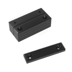 Black Rectangular Block Epoxy Neodymium magnet with double countersunk hole for screwing and with dimensions 50mm x 12mm x 4mm x (4mm x 4mm Double Hole), grade N52, featuring a nickel-copper-nickel coating and an 10.75KG pull force, Perfect for drilling or fixing into place due to their countersunk hole, they are commonly used for DIY, crafts, woodworking, furniture making, manufacturing and science experiments.