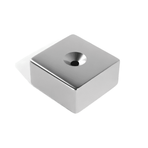 Square Block Neodymium magnet with countersunk hole for screwing and with dimensions 50mm x 50mm x 25mm x (8mm Hole), grade N52, featuring a nickel-copper-nickel coating and an 138.25KG pull force, commonly used in DIY, crafts, furniture design, fixings, kitchen design, lock mechanisms and science experiments.