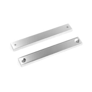 Rectangular block channel magnets with countersunk hole for screwing and with dimensions 80mm x 13.5mm x 5mm (Two 3.3mm c/s holes), grade N35 , featuring a nickel-copper-nickel coating and an 33KG pull force, commonly used for securing into a flat service and used as magnetic door latches or holding display items and signs into place.