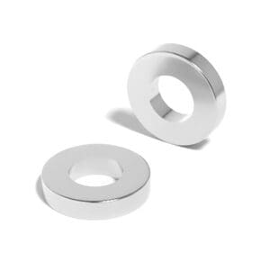 Round Circular Disc Neodymium magnet with ring hole with dimensions OD50mm x ID25mm x T10mm, grade N52 , featuring a nickel-copper-nickel coating and an 165KG pull force, commonly used for DIY, speaker assemblies, electric motors, science experiments, manufacturing processes and much more.